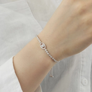 Detail view of silver S925 sterling silver evil eye bracelet with cubic zirconia