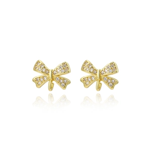 Gold bow stud earrings with sparkling white zircon crystals and a clear mirror reflection