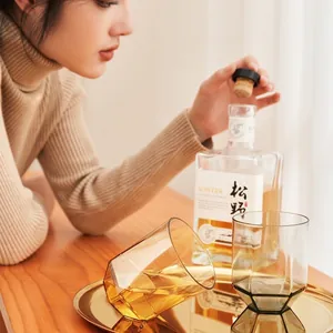 Elegant amber gold hexagonal glass cup set with luxury geometric faceted design