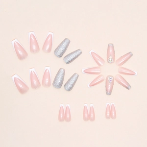 French white tip ballet nails with sparkling silver glitter and rhinestone accents