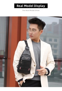 Close-up of black PU leather chest bag featuring tricolor ribbon and metal logo detail