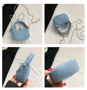 Detail view of light blue denim crossbody bag showing chain strap and multiple angles
