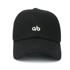 Classic black cotton baseball cap with white ab embroidery and curved brim in front view