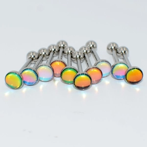 Close-up of multicolored rainbow stainless steel tongue rings with flat round heads