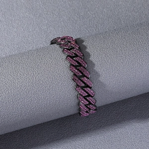 Hip hop black Cuban link bracelet with sparkling pink rhinestones around a display cylinder