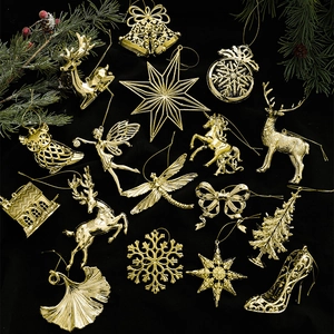 Golden Christmas tree ornaments set with reindeer and snowflakes on black background
