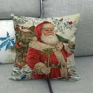 Housse de coussin décorative de Noël avec Père Noël et chien sur un canapé