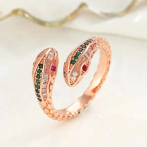 Retro rose gold bypass snake ring with micro-pave green and white cubic zirconia