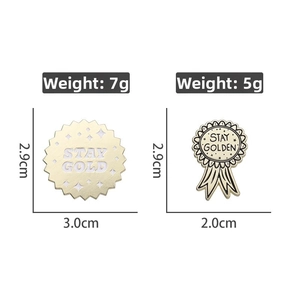 Size guide for enamel pins showing weight and dimensions of two stay gold badges
