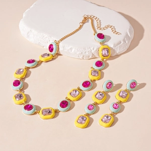 Colorful geometric jewelry set with pink stones and enamel necklace and earrings