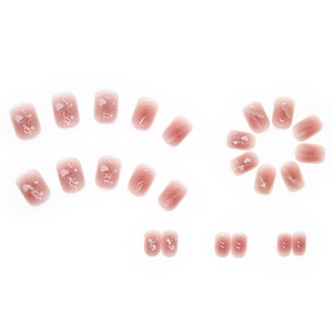 Pink gradient press-on nails set with subtle shimmer and cloud patterns, short oval shape
