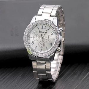 Classic silver Geneva quartz watch for women with diamond-encrusted bezel and metal strap