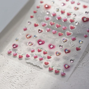 Sparkling crystal heart and peach nail art stickers with pink gradient and lace patterns