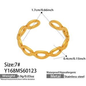 Macro view of gold chain ring details including waterproof and hypoallergenic properties
