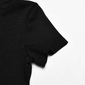 Close-up of black short sleeve detail showing knit fabric texture and premium sheen