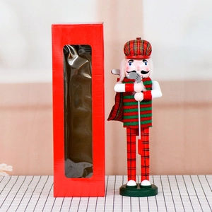36cm golf nutcracker in striped outfit with club and red window display gift box