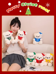 Close-up of festive Christmas teddy bears in various colorful holiday outfits and hats
