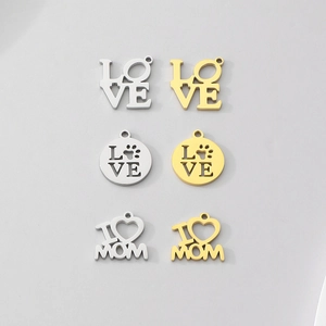Detailed view of DIY stainless steel love and heart charms in gold and silver finishes