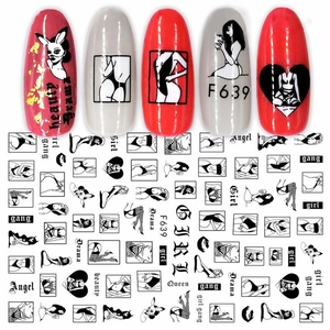 Detail of 3D cartoon nail stickers featuring black female illustrations and text on red nails