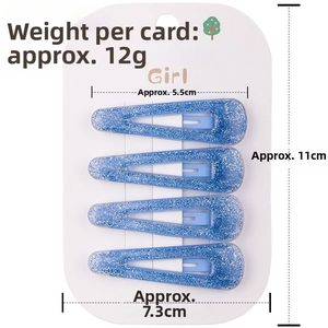 Detail view of 4-piece set blue glitter BB hair clips with 5.5cm length on white card