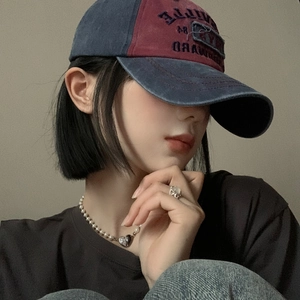 Retro washed denim baseball cap in navy and dark red with embroidered lettering