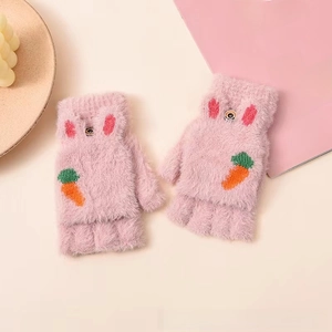 Detail of pink plush convertible gloves featuring carrot embroidery and fuzzy texture