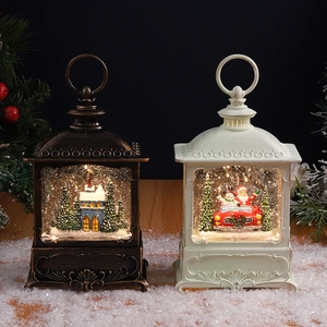 Detail of Christmas lantern snow globe with glowing LED lights and festive holiday scenes
