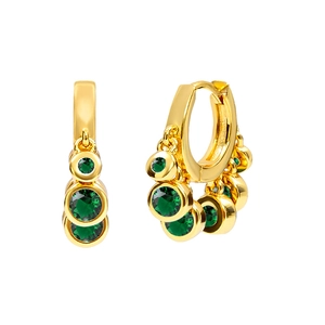 Detailed view of gold hoop earrings with multiple hanging round green gemstones