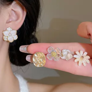 10-piece floral stud earring set with pearl and rhinestone heart designs for women