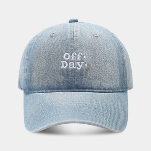 Front view of light blue denim baseball cap featuring white Off Day embroidery detail