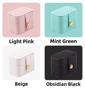 Mini travel jewelry organizer in pink, green, beige and black PU leather with button closure