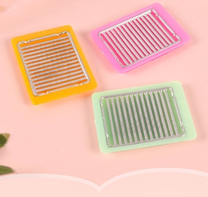 Miniature colorful dollhouse barbecue grills in pink, yellow and mint green for DIY crafts