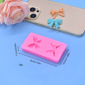 Pink bow tie silicone mold for DIY cake decorating and baking with finished samples
