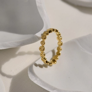 Minimalist 18K gold-plated honeycomb geometric ring with organic lava texture finish