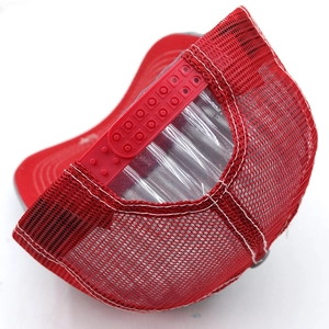 Detail view of the breathable red mesh back and adjustable snapback closure on baseball cap
