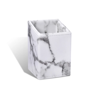 Elegant marble pattern makeup brush holder with dustproof cover and white background