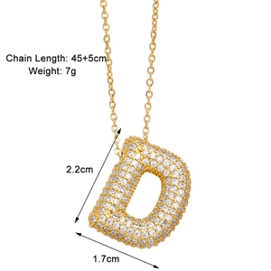 Detail view of gold letter D pendant with white zircon inlay and 45cm chain dimensions