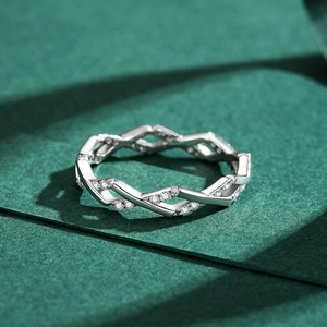 Minimalist S925 sterling silver ring with geometric hollow weave and micro-inlaid zircon