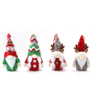 Set of four handmade glowing Christmas gnomes with reindeer antlers and hanging loops