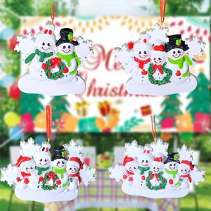 Set of four resin Christmas snowman family ornaments with festive red, green and white accents