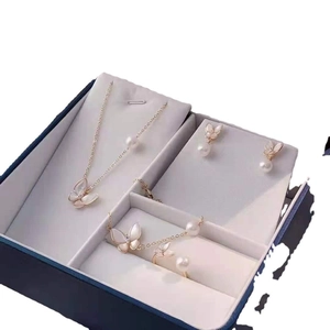 Elegant butterfly shell pearl jewelry set including necklace, earrings, ring, and bracelet