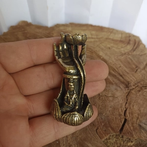 Detailed view of handmade solid brass Buddha hand lotus backflow incense burner