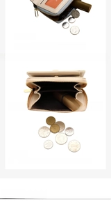 Detail view of beige multi-slot wallet interior with card slots and coin pocket