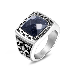 Vintage silver men's ring with blue sandstone gem and intricate relief engraving