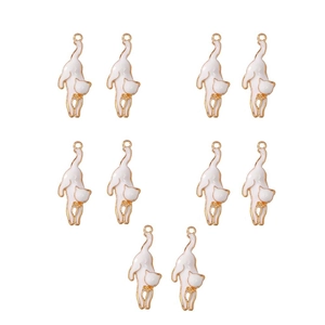 Detailed view of ten cartoon cat alloy charms with white enamel and golden plating