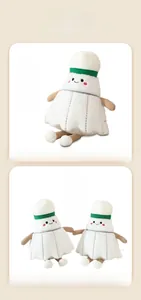 Detail shot of the soft plush texture and cute facial expression of a badminton doll