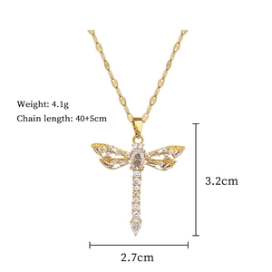 Detailed specs for golden dragonfly pendant with cubic zirconia, weighing 4.1g and 3.2cm high