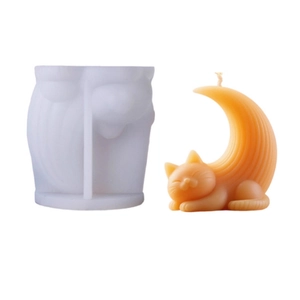 Silicone mold and candle finish featuring a cute cat sitting on a crescent moon design