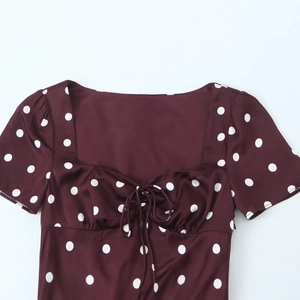 Retro burgundy polka dot dress with square neck and tie-front detail in satin fabric