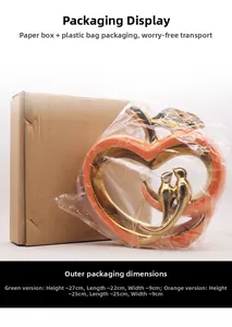 Detail van de keramische appeldecoratie in oranje en afmetingen van de verpakking